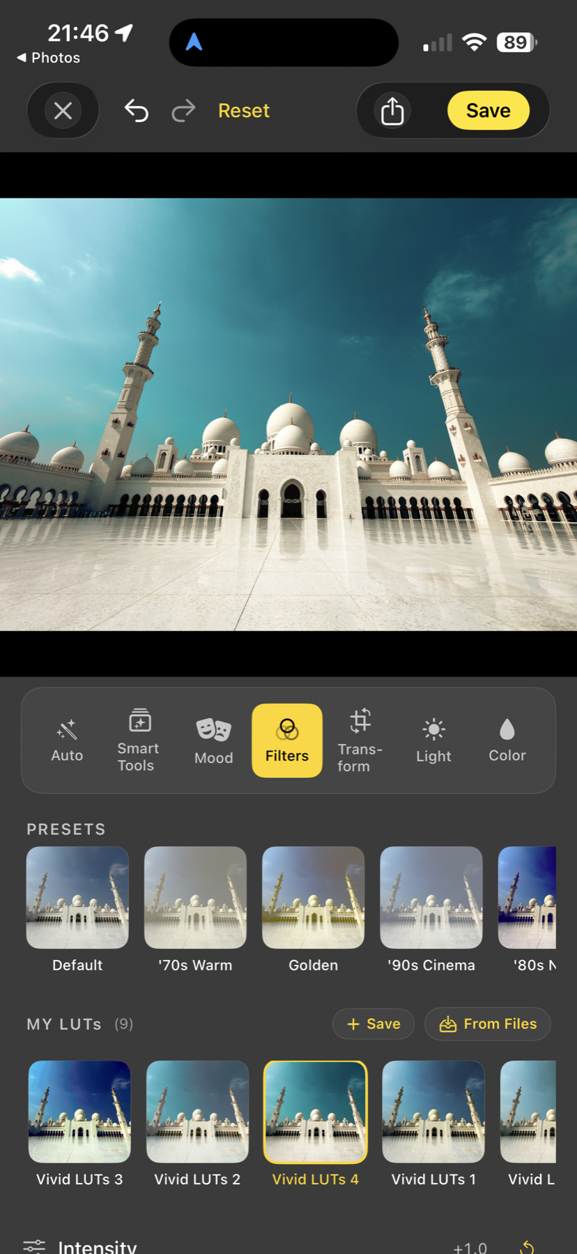Acetate editor showing the Filters tab over a wide-angle mosque photo, with the eight built-in era LUTs in the PRESETS strip and a row of user-saved LUTs in MY LUTs below